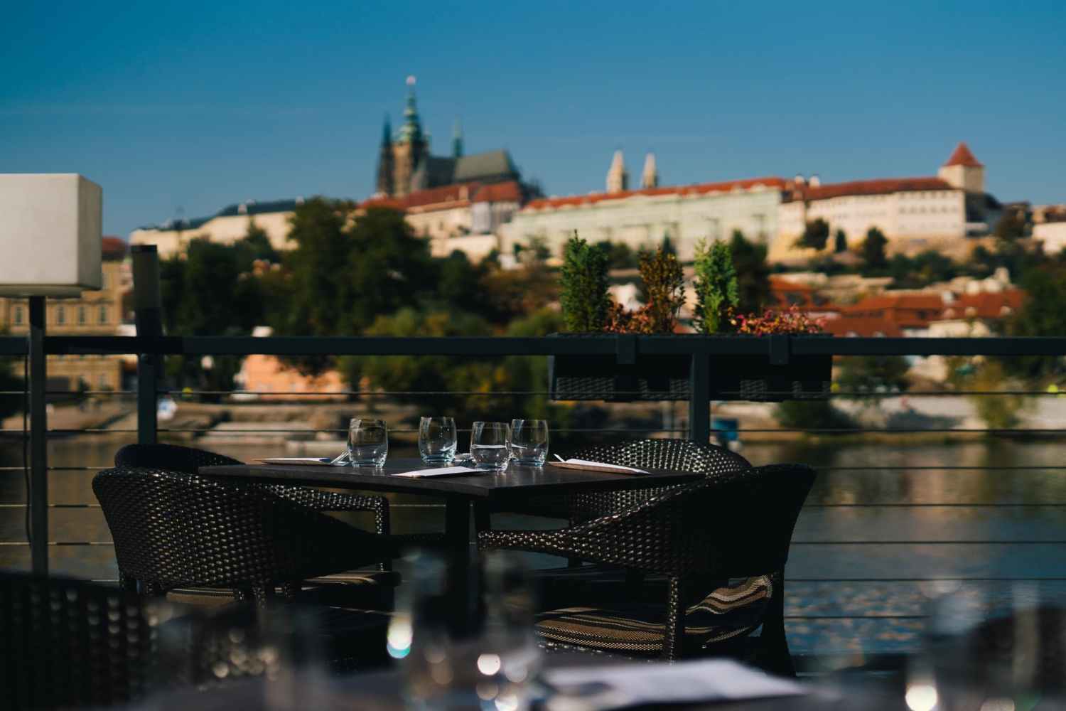 a table topped with a blue umbrella